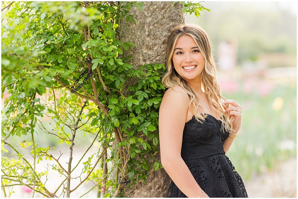 Spring Senior Session at Maymont Park | black dress and white boots in Italian Garden