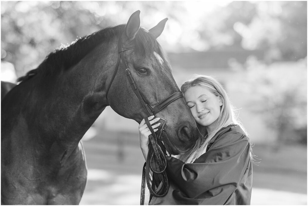 senior pictures with horse in cap & gown for high school graduation