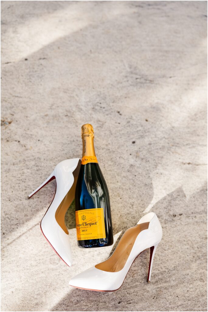 Veuve Clicquot and red bottom heels