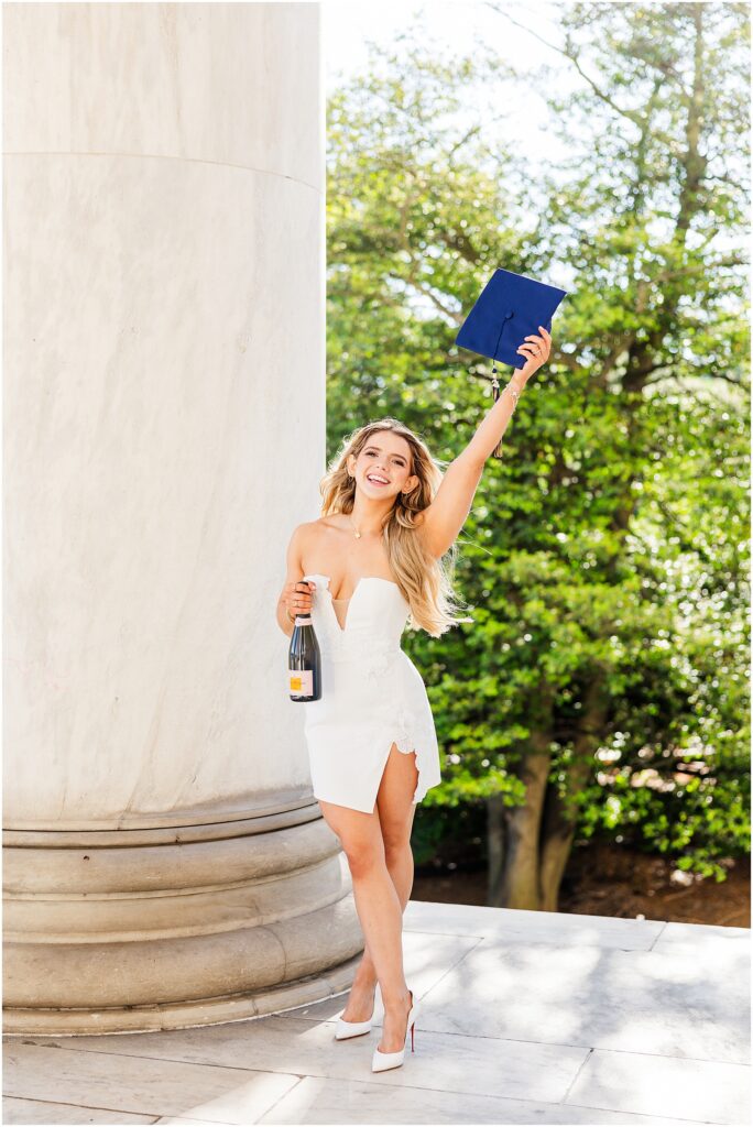 GWU grad pictures with champagne