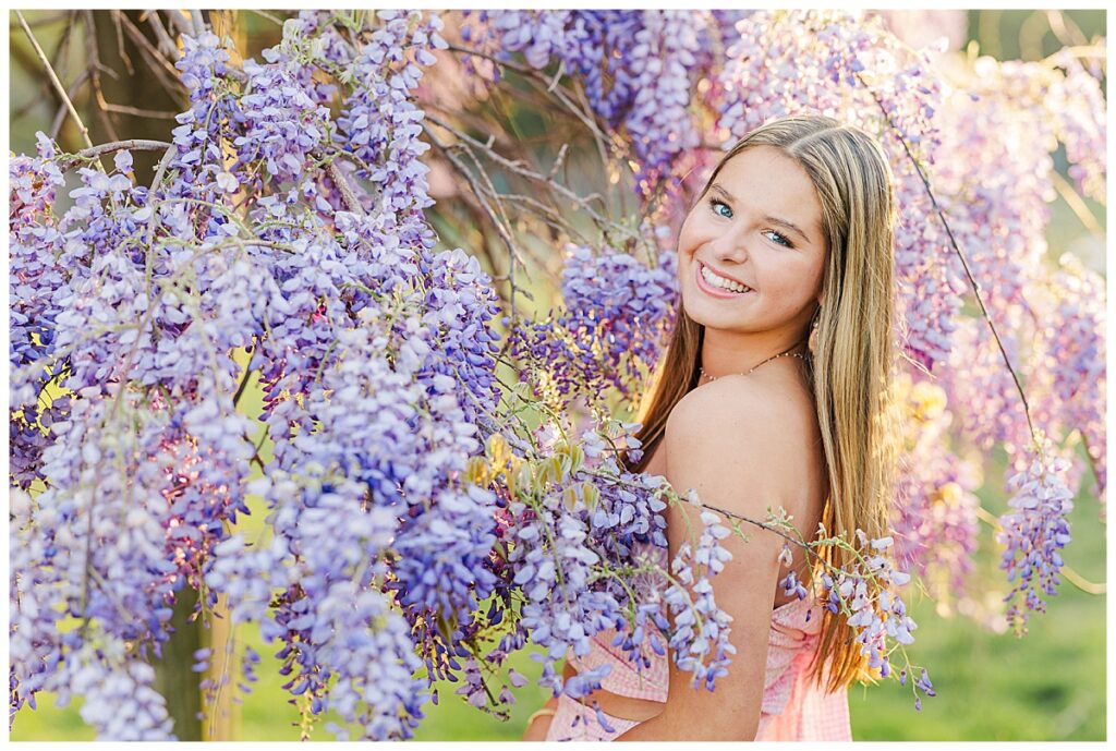 wisteria spring senior session at the Preserve at Dundee 