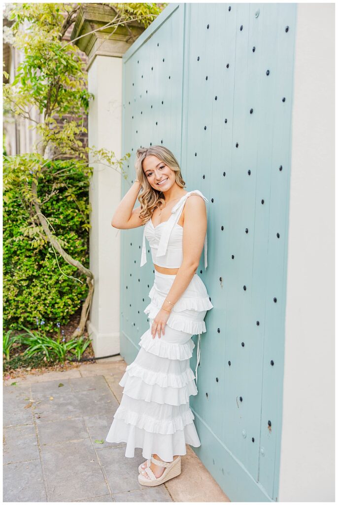 senior portraits on Monument Avenue at the Blue Shutter House