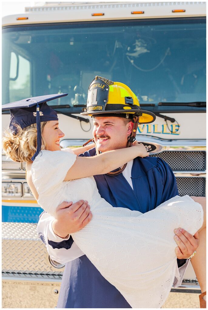 graduation photos with a fire truck | Longwood University